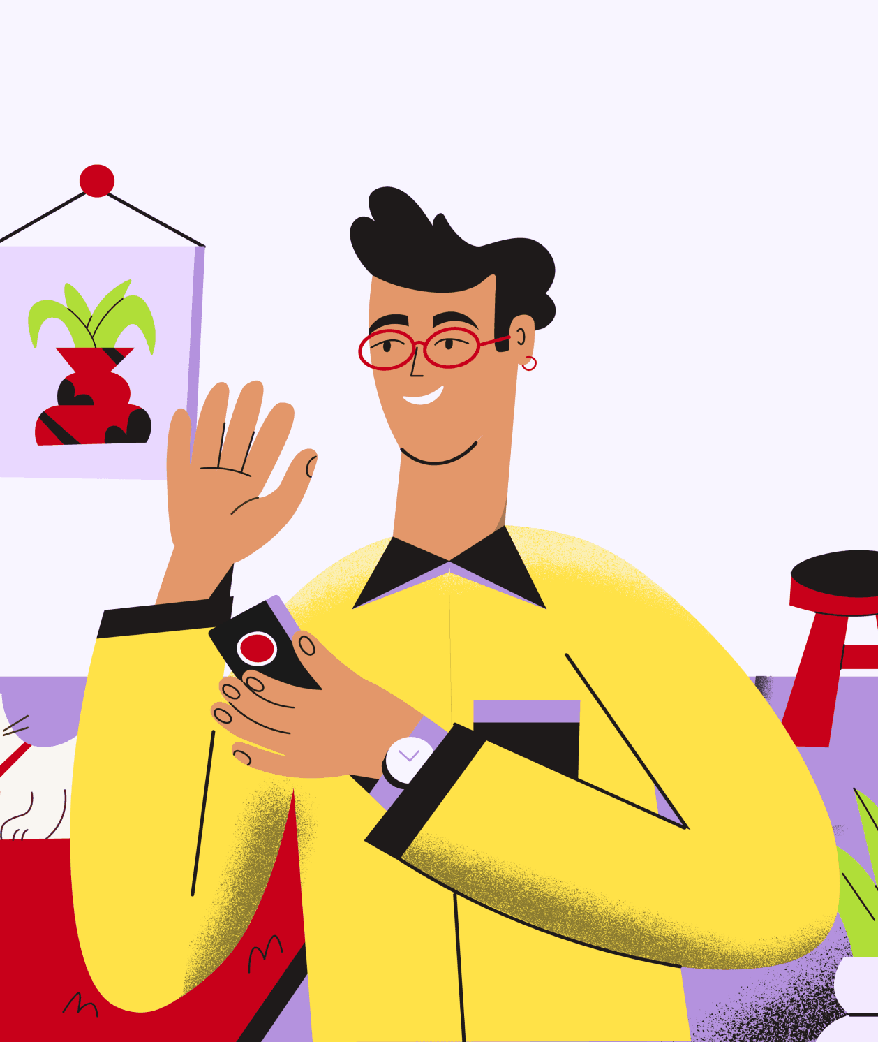 A smiling man holding a phone